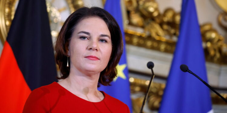 German Foreign Minister Annalena Baerbock attends a joint news conference with French Foreign Minister Jean-Yves Le Drian (not seen) after a meeting at the Quai d'Orsay in Paris, France, December 9, 2021. REUTERS/Gonzalo Fuentes/Pool